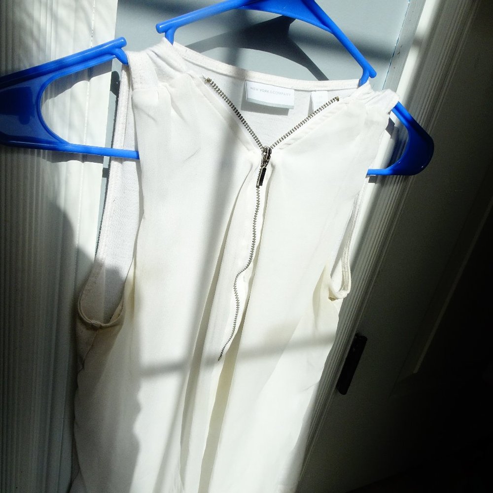 white zip up shirt